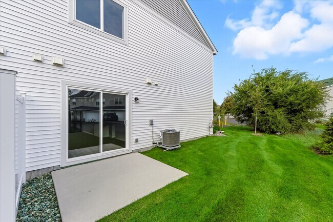 Photo - New construction end-unit townhome in Zimm...