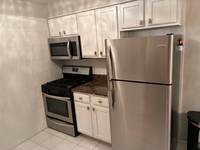 Photo - 9440 S 79th Ct Unidad 3NW