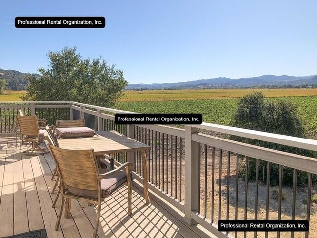 Photo - Upper Carriage house Flat with deck & expansive Vineyard and Sunset views