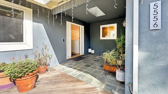 Photo - Light-Filled Home with Beautiful Garden & 2-Car Garage