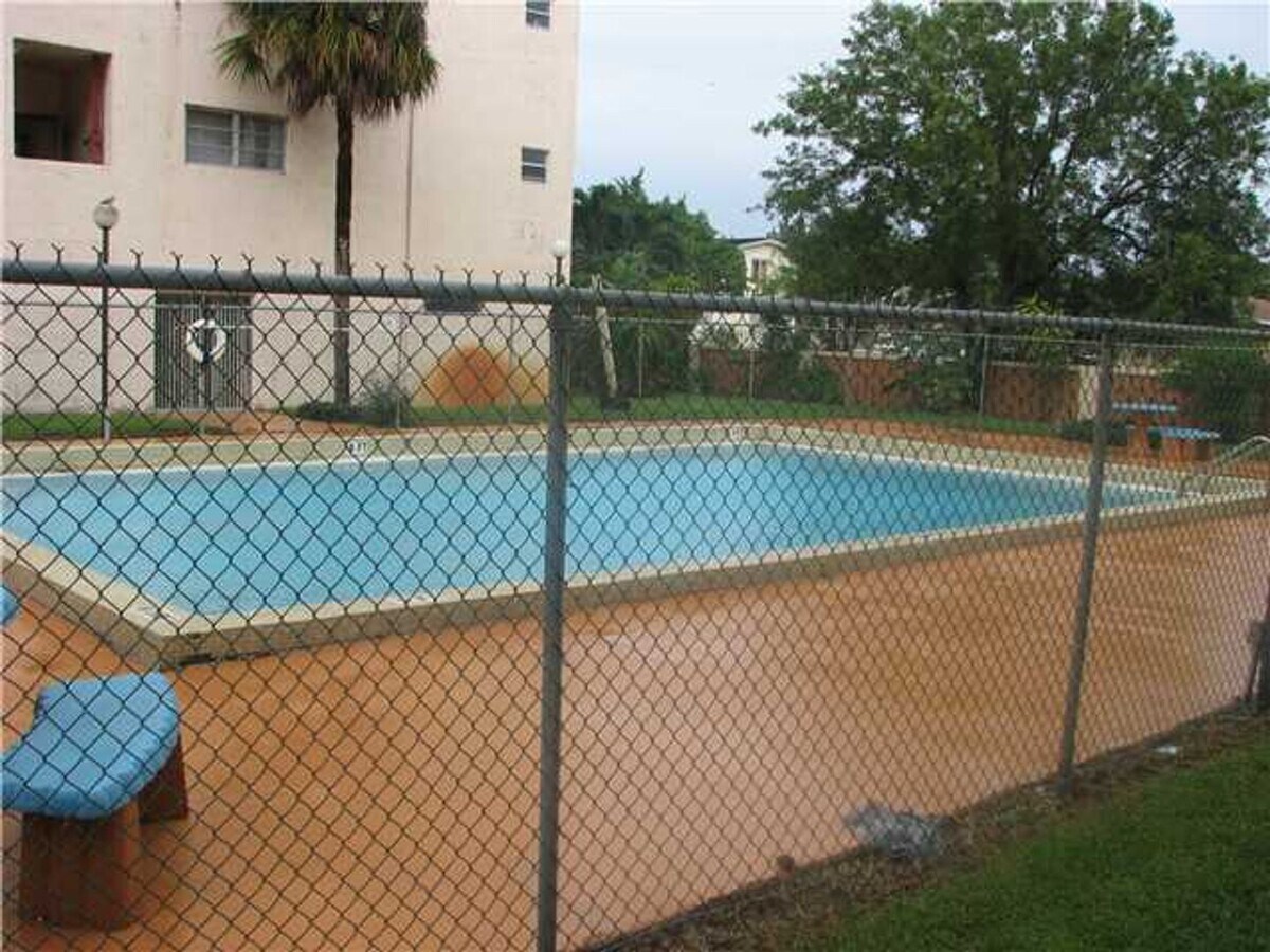Photo - Spacious 1 Bed, 1.5 Bath Apartment in Gated Hialeah Community - Available July 2025!