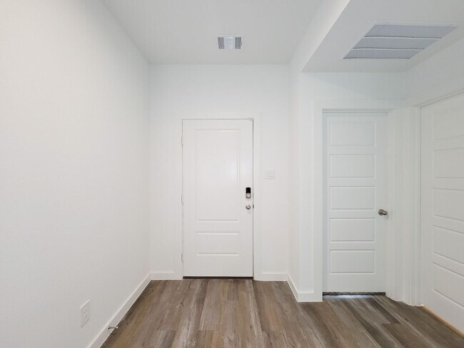 Photo - This stunning 4-bedroom, 2-bathroom Rosharon lease features modern upgrades, an open-concept layo...