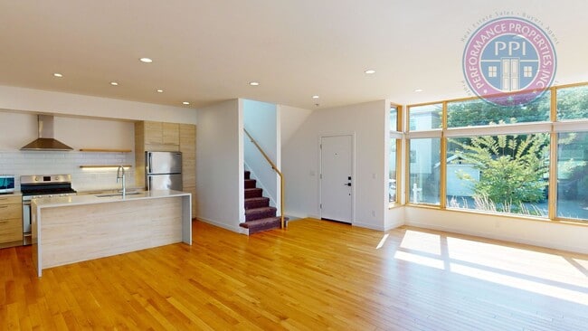 Photo - Modern Townhome In SE Floor to Ceiling Wi...