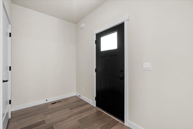 Photo - Brand New, Stylish 4-Bedroom Home with Vaulted Ceilings and Private Patio