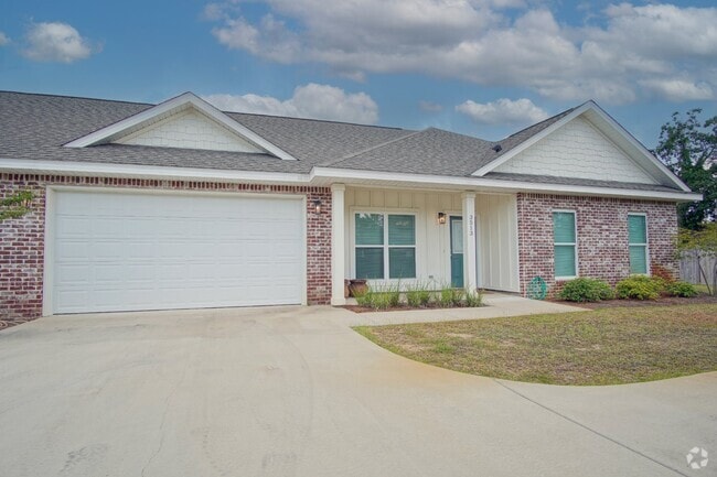 Building Photo - Beautiful Pet-Friendly 3BR/2BA Brick Townh... Rental
