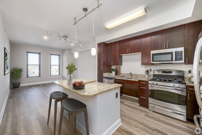 Kitchen with LTV flooring (virtually staged)