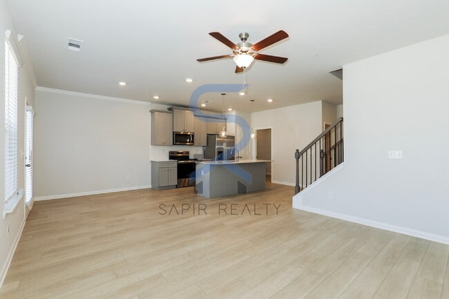 Photo - Move in before February 28th and choose your reward: a $250 Amazon Gift Card or a 55" Smart TV!