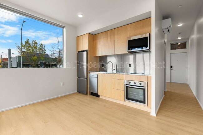 Building Photo - 7480 N Delaware Ave Unit 104