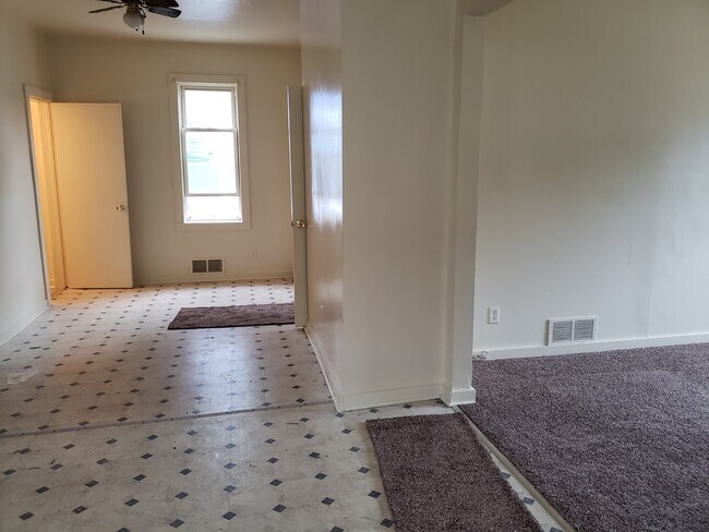 Photo - Spacious 5BR Home with Eat-In Kitchen | Upper Loft Area | Partially Fenced in Yard | 2,200 SQF