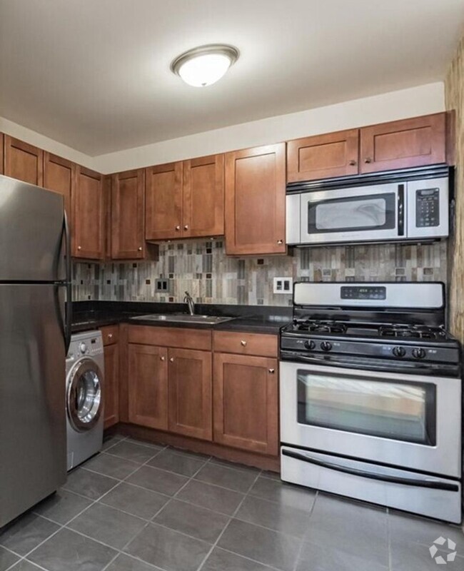 Building Photo - NEWLY AVAILABLE - RENOVATED 2 BR Unit 101 Rental