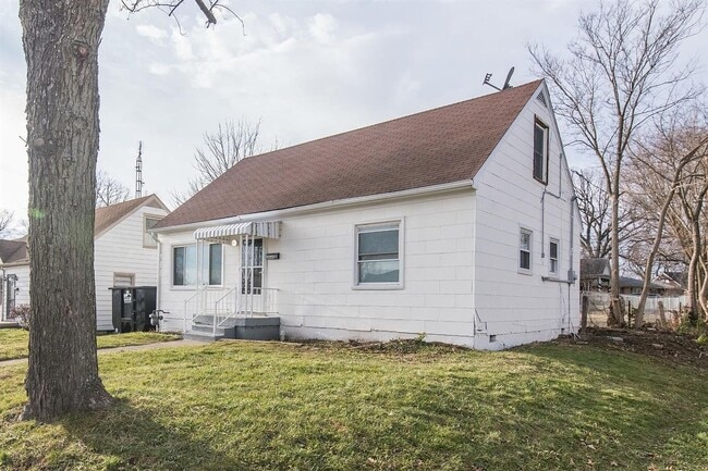 Photo - Spacious 4-Bedroom, 2-Bath Home with Garag...