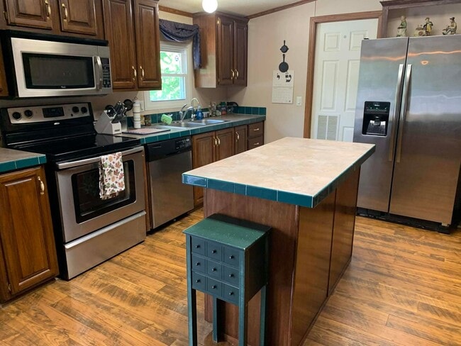 Photo - Welcome to this  4-bedroom, 2-bathroom home located in the picturesque Sevierville, TN.