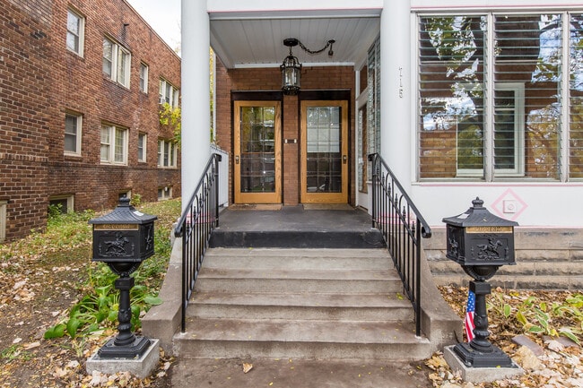 Front Entrance Restored with Antique Storm Doors and Lantern - 715 5th St SE Unidad Upper