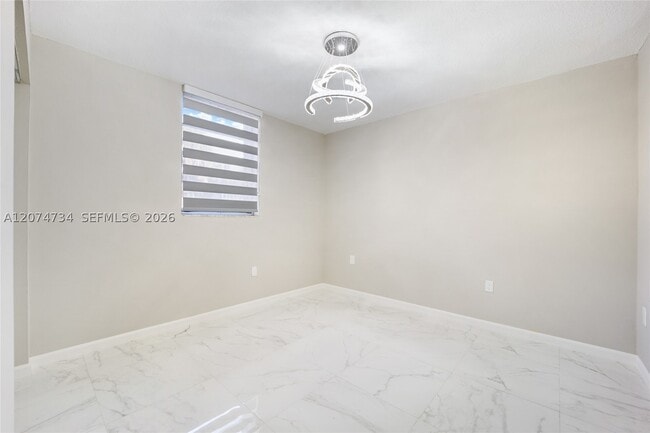 Building Photo - 10000 NW 80th Ct Unit 2102