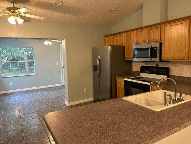 Kitchen with extra room can use as dining room, office, play area - 3 Frank Pl