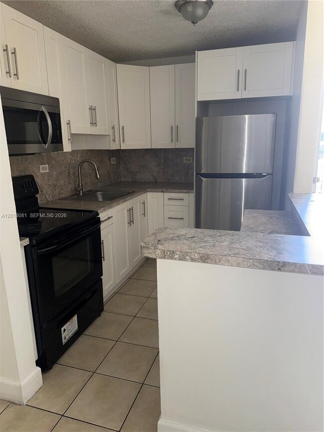 Photo - 7120 NW 179th St Unit 105