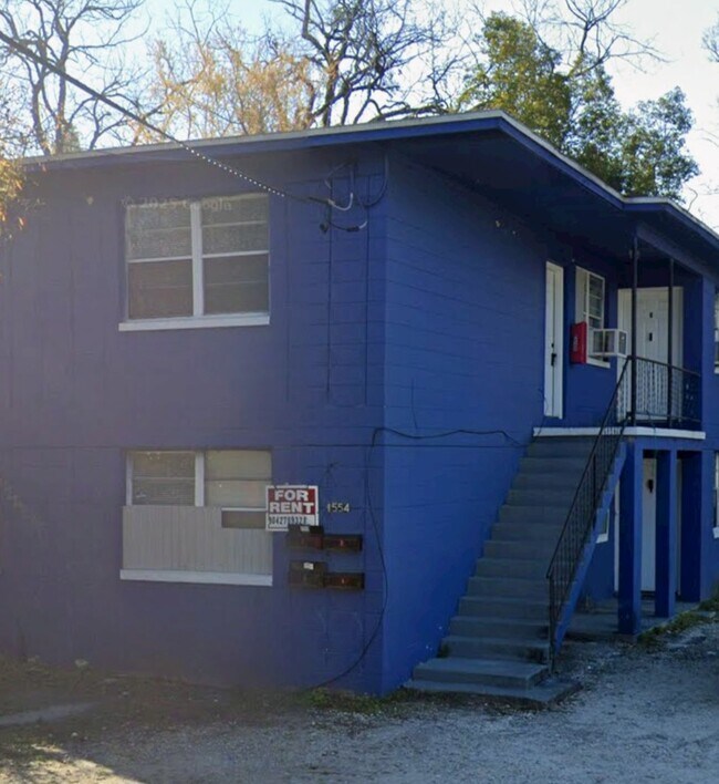 Building Photo - 1554 W 22nd St Unit 4