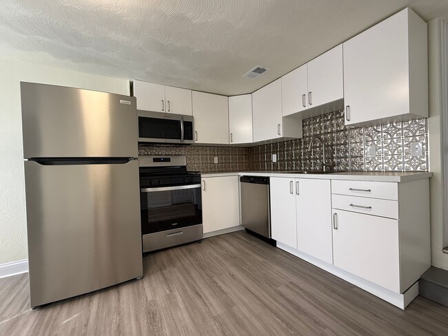 Building Photo - Updated 2BR 1.5 Bath House now available!