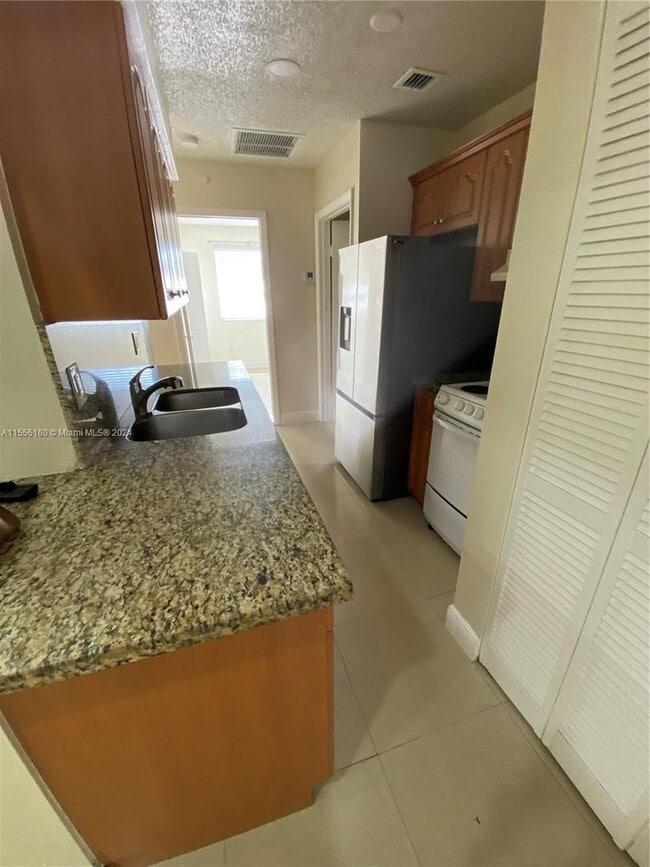 Building Photo - 18312 NW 68th Ave Rental