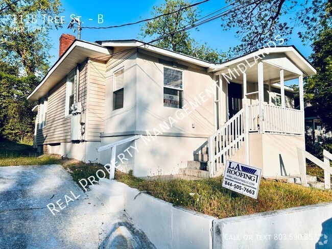 Building Photo - Charming 2-Bedroom Duplex Unit B Rental