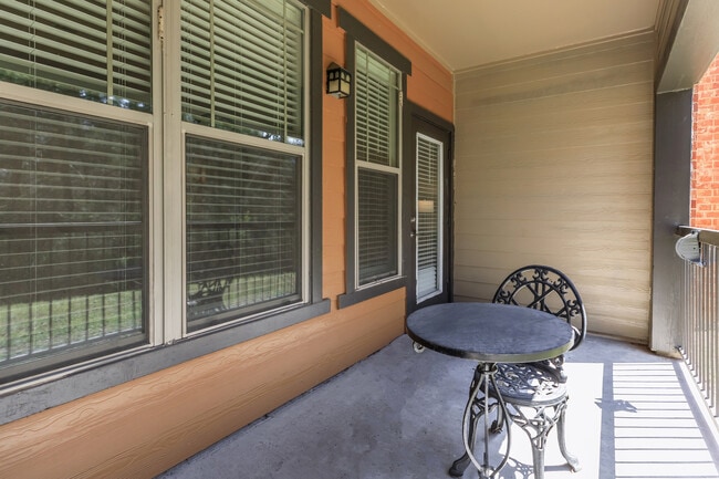 Spacious Balconies and Patios at The Woods of Five Mile Creek in Dallas, TX - The Woods at Five Mile Creek Apartments