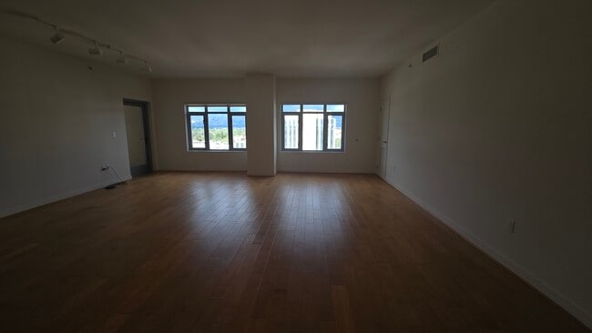 Living room view from entrance - 175 W Saint James St Unit 1309