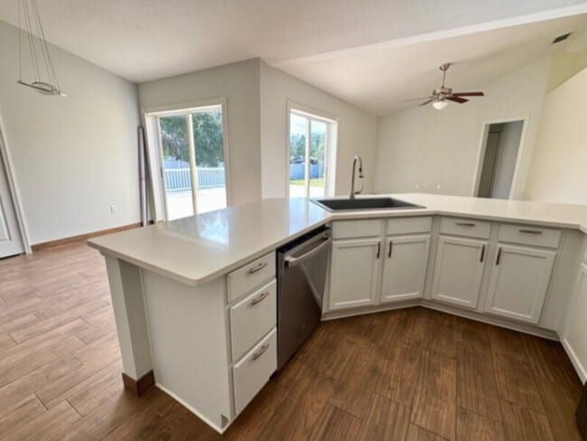 Photo - Stunning 4 Bedroom, 2 Bath Home with HUGE Patio &amp; Backyard