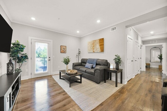 Pointe Grand Apartments Living Room