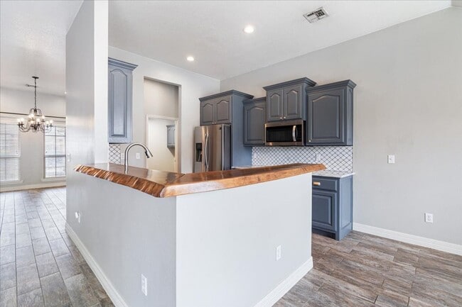 Photo - Discover this spacious 4-bedroom, 2-bath home