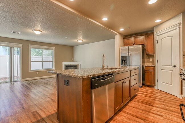 Photo - Centrally Located 4 Bedroom Townhome with Attached Garage & AC