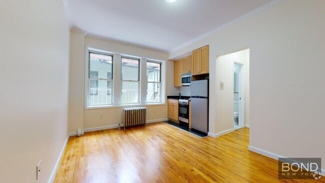 Building Photo - 117 W 13th St Unit 7 Rental
