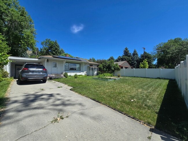 Photo - Spacious 4 Bedroom Home with Solar Panels, Fully Fenced Yard on Rimrock Rd
