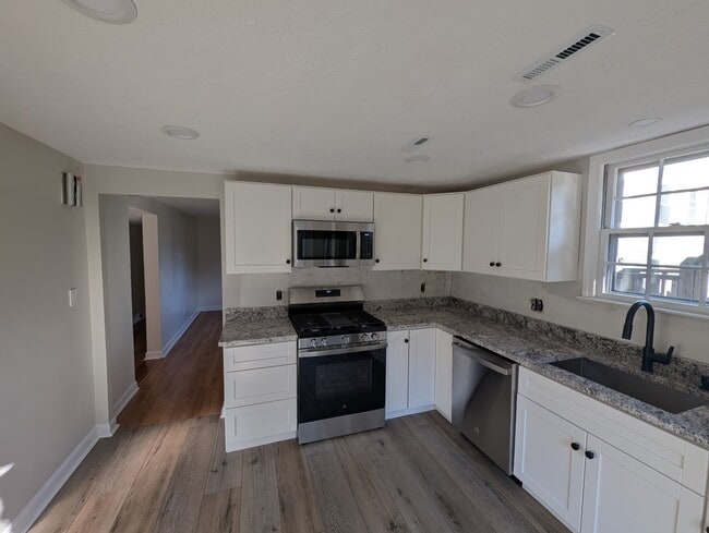 Kitchen into living room. - 24 Curtis St Unit 24 Curtis St. #1