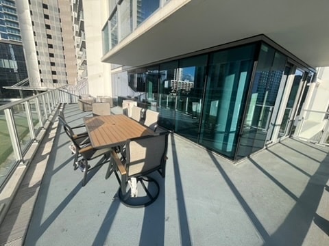 new table and couch for the lanai - 1500 Rycroft St Unit 312R