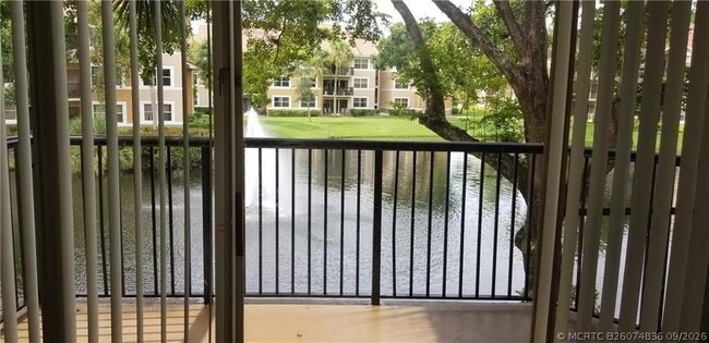 Photo - 8701 Wiles Rd Unit 204