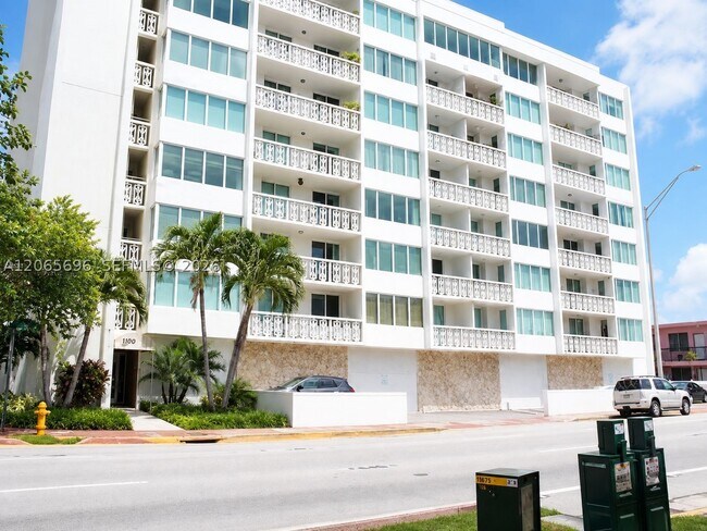 Building Photo - 8233 Harding Ave Unit 703