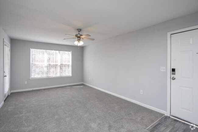 3BR, 2BA - 1,153SF - Living Room/Dining Room - Retreat at Baywood