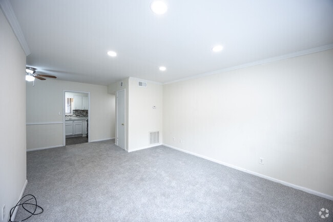 1BR, 1BA - 840SF - Living Room - The Pines on Scott