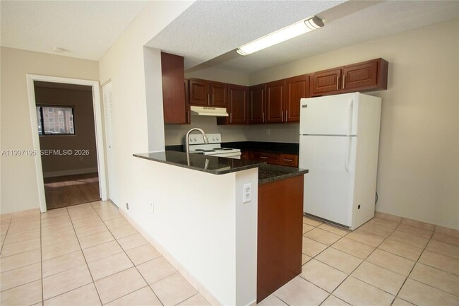 Photo - 9491 Palm Cir S Unit 101