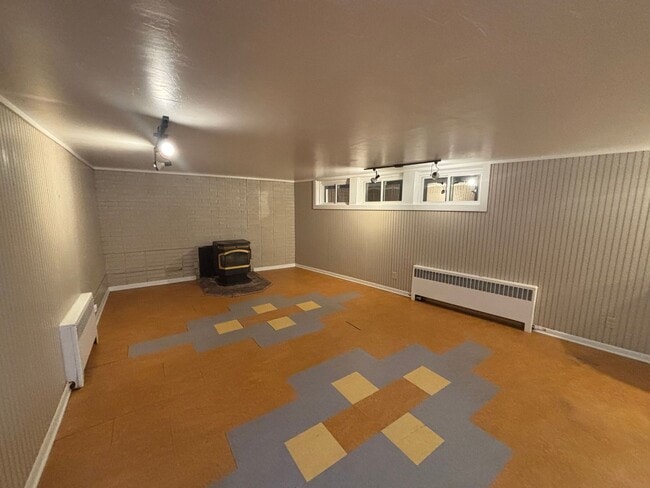 Photo - Spacious 2BR Basement Apartment – Utilitie...