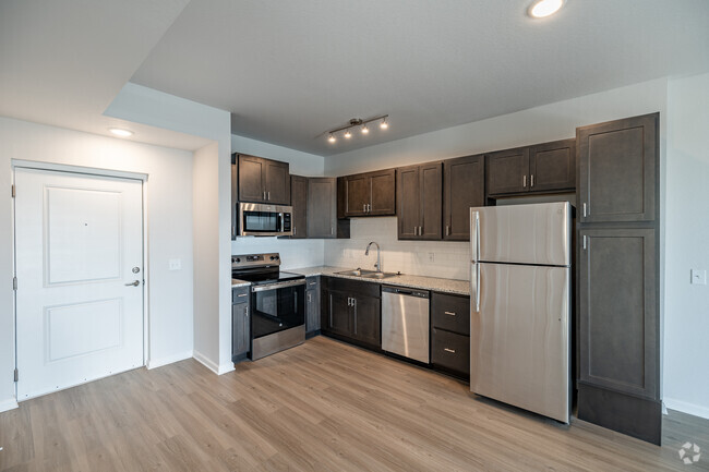 1BR 1BA - 727SF Kitchen - Ekos at Cadenza II Rental