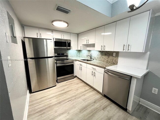 Building Photo - 636 NE 63rd St Unit 6 Rental