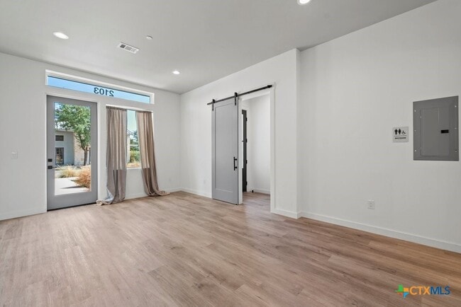 Building Photo - 1208 N Academy Ave Unit 2203