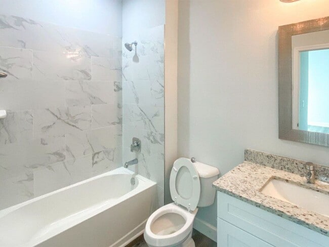 Photo - Modern 3 bedroom 2 bath 1 car garage Duplex, just build in 2023 with stainless appliances Unit 8497