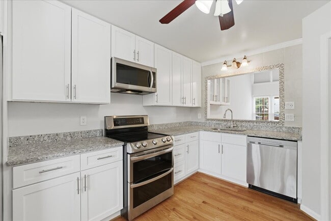 Photo - Welcome home to this beautifully updated and move-in-ready 3-bedroom, 3.5-bath townhouse