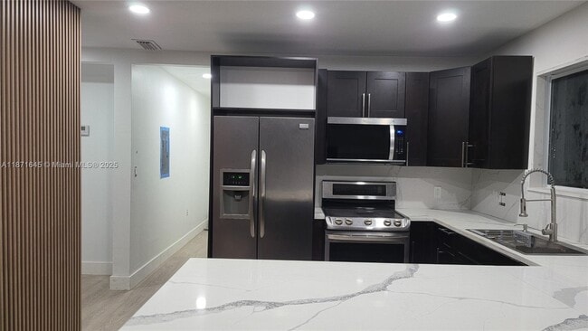 Building Photo - 2310 NW 103rd St Rental