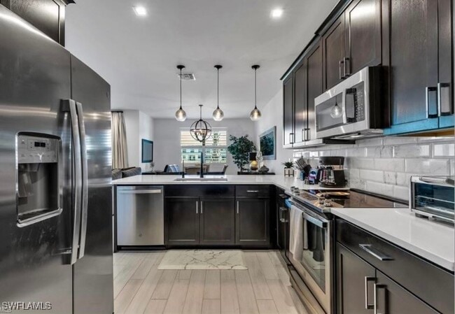 Building Photo - 7580 Carnegie Way Rental
