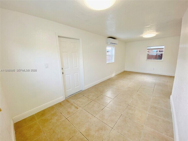 Building Photo - 2996 NW 93rd St Unit C