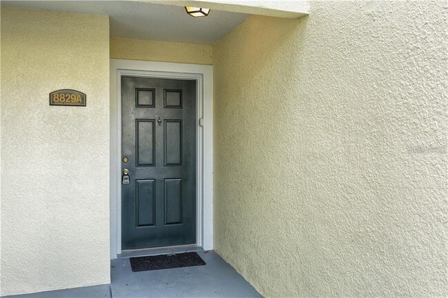 Building Photo - 8829 Grand Palms Cir Unit A
