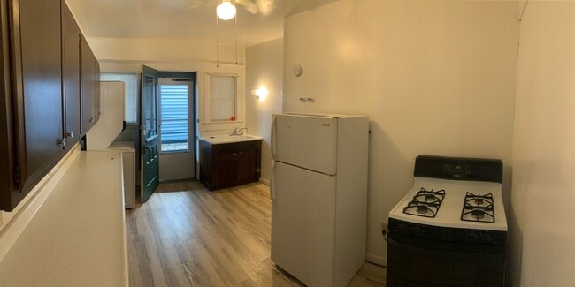 Photo - ***NO PET DOGS*** 2 Bedroom - All Utilities Included Unit 2 Bed Lower - Front Building